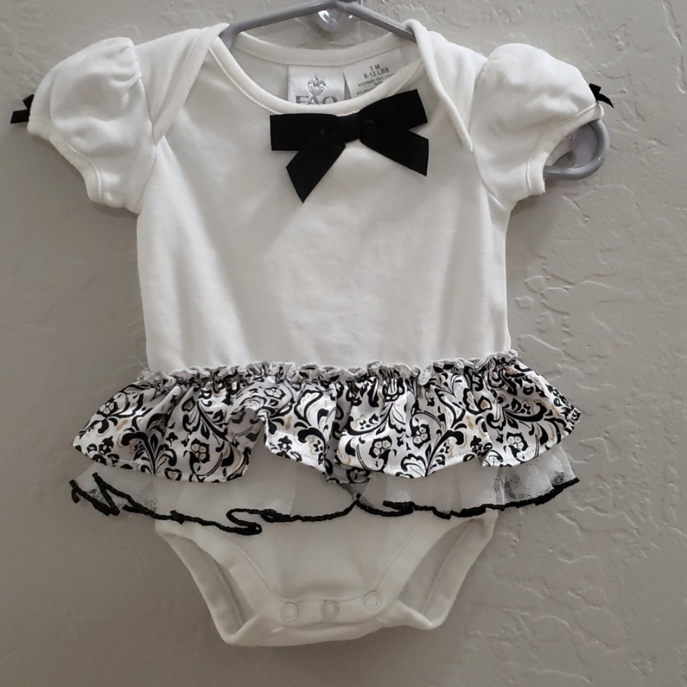 White and black ruffle onesie